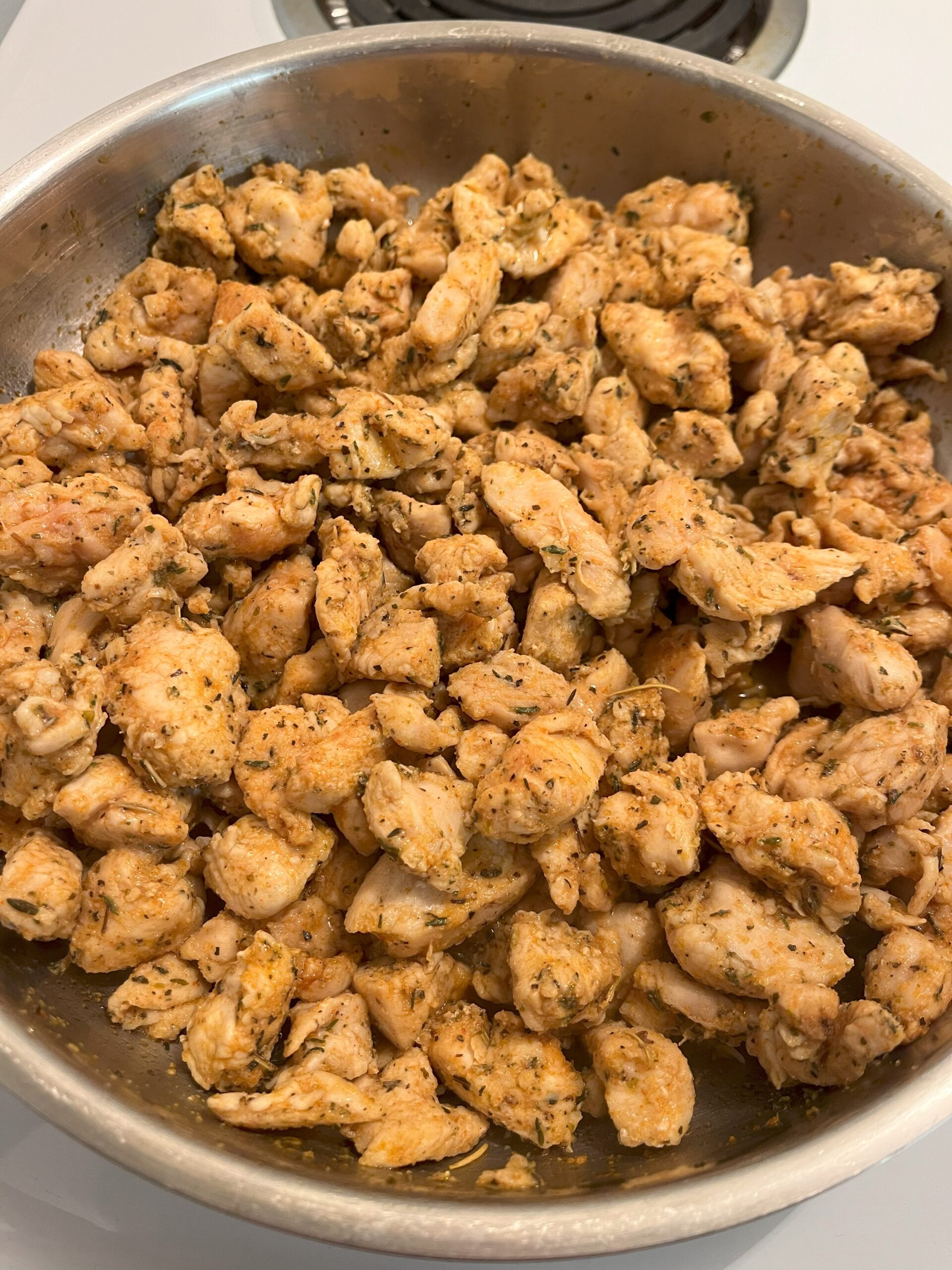 Cooked and seasoned chicken.